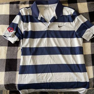Nike golf polo with Minnesota Twins logo on sleeve